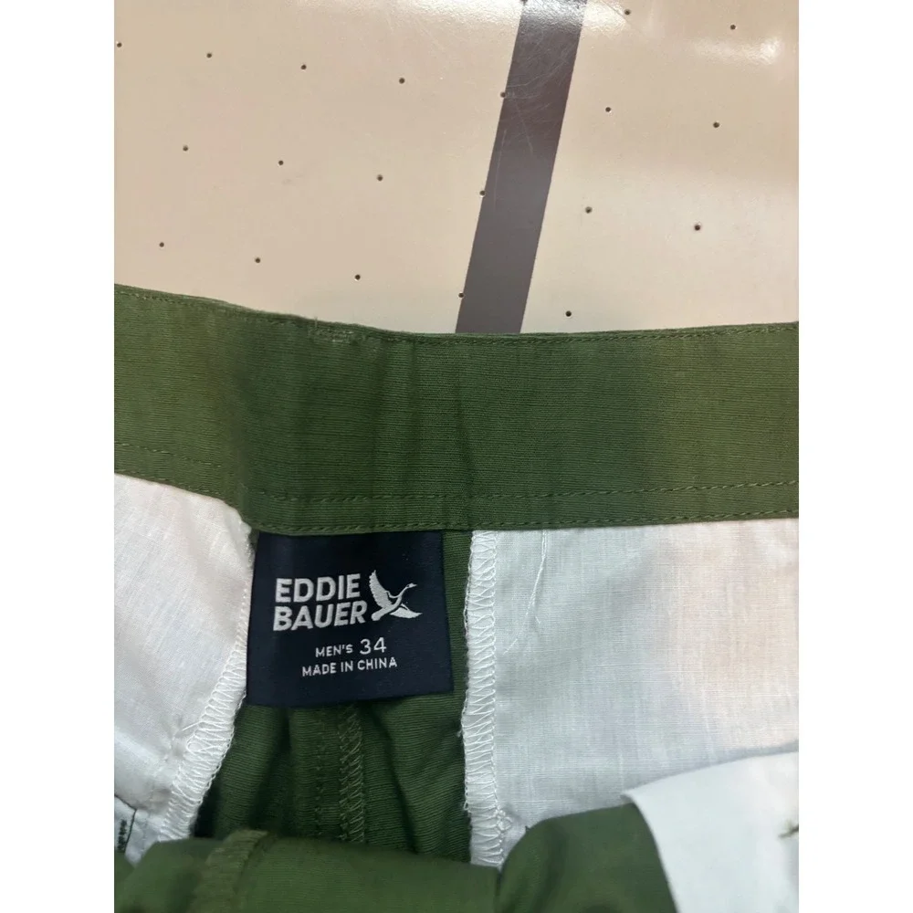811 Eddie Bauer Mens Cargo Shorts Green Utility Size 34 NWT few string issues.